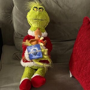 Universal Green Character Plush in Red Santa Outfit